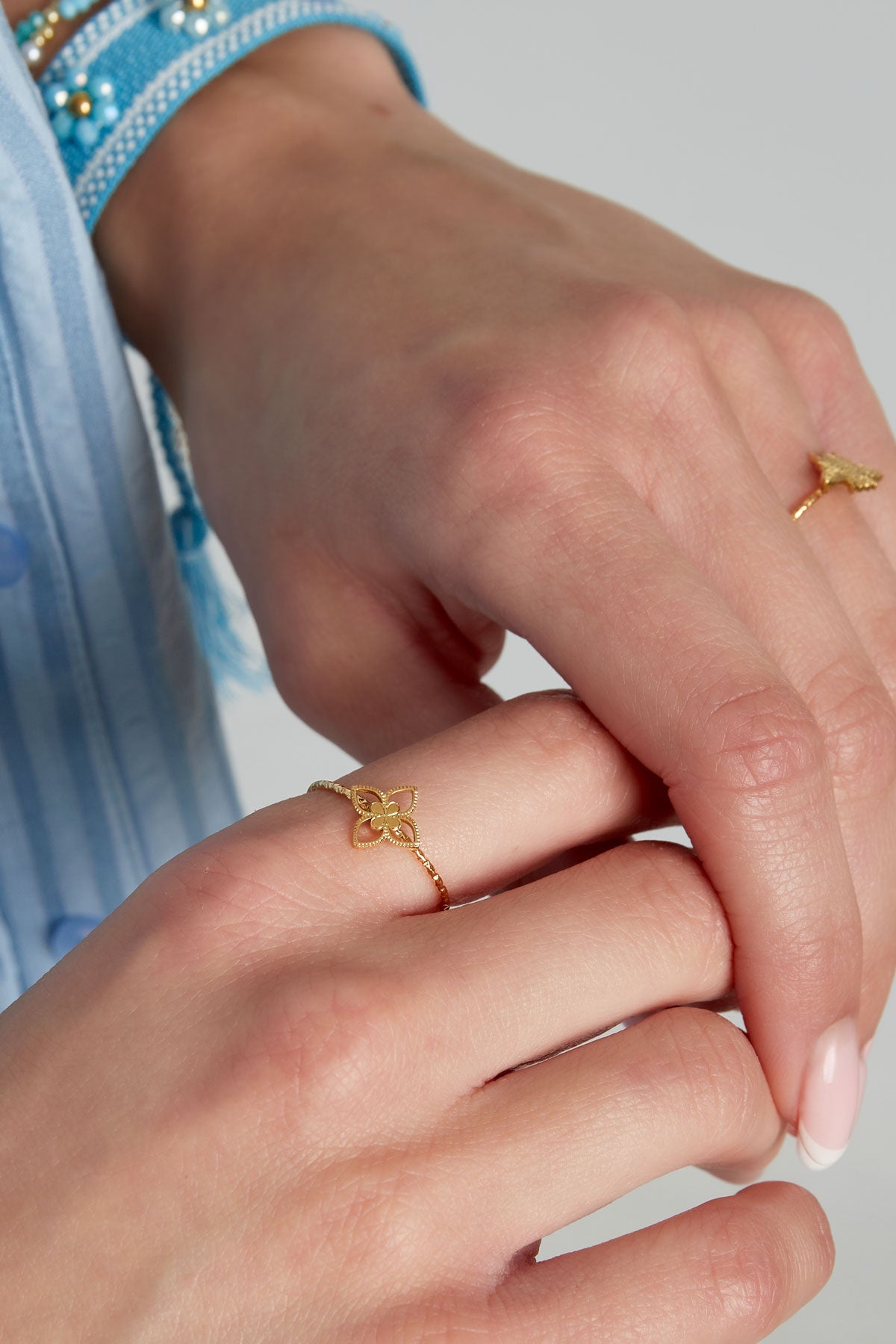 Stainless steel ring with a floral clover