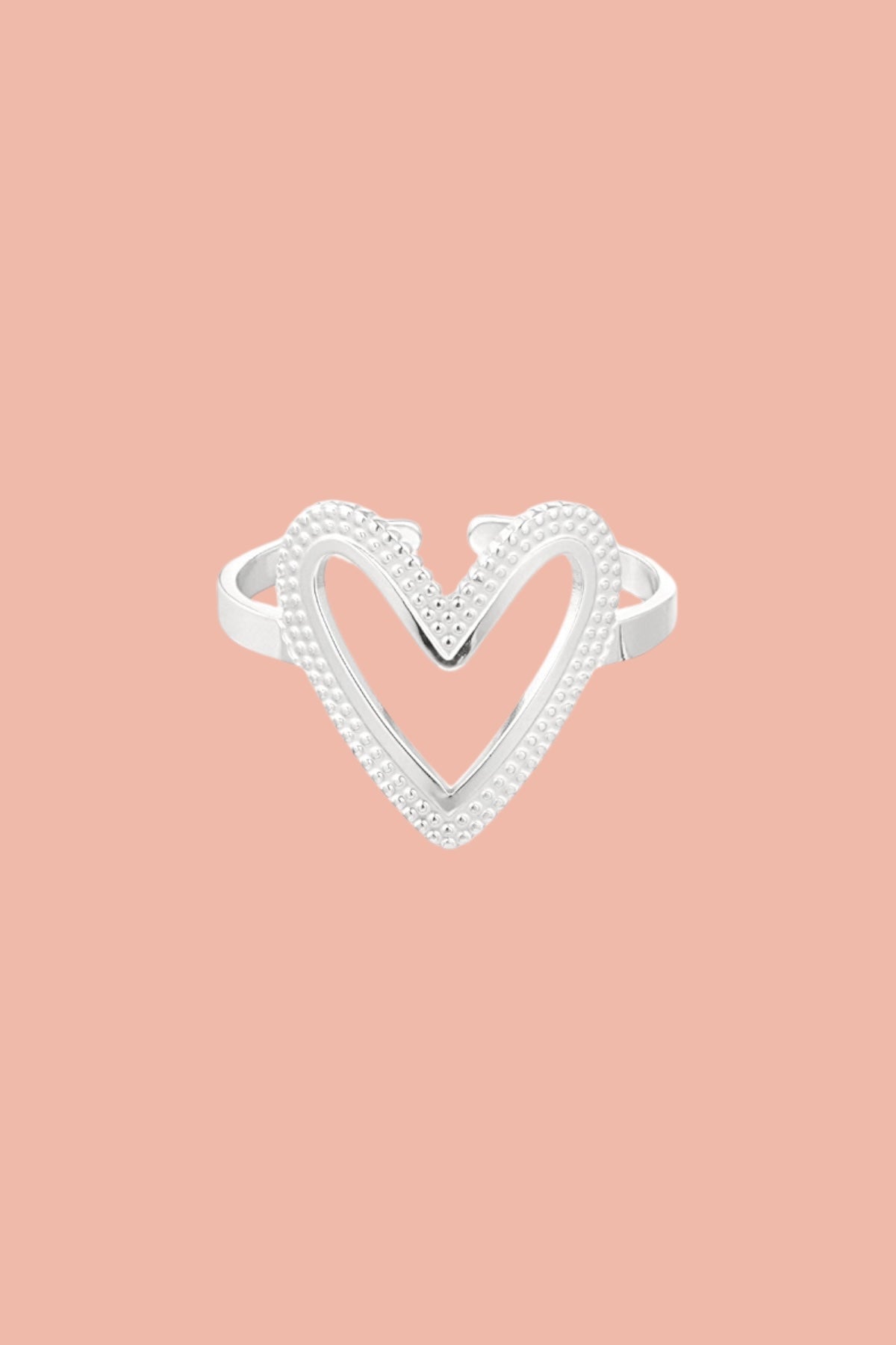Stainless steel ring with a open heart