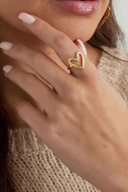 Stainless steel ring with a open heart