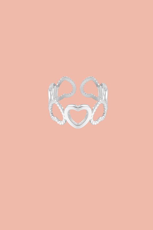 Stainless steel ring with open hearts